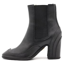 Stivaletti Chelsea da donna in pelle nera con dettagli wingtip - Thom Browne