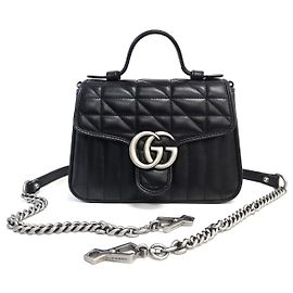Gucci Mini borsa a tracolla con patta in pelle matelassé GG Marmont nera