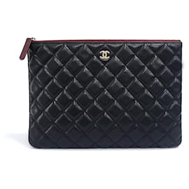 Chanel Clutch Caviar New Medium Black