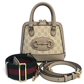 Gucci Mini borsa a mano e a tracolla GG Supreme con mors beige