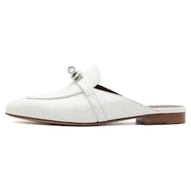 Hermès Weiße Ziegenleder-Mules mit Kelly-Schnalle
