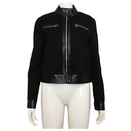 Gucci Schwarze Damenjacke aus GG Logo Canvas mit Lederbesatz und Kontrast-Reißverschluss