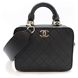 Chanel Borsa porta cosmetici con manico superiore e tracolla nera