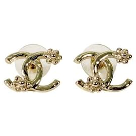 Chanel Orecchini a forma di fiore di camelia in oro