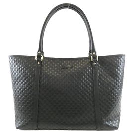 Borsa Gucci in pelle nera GG