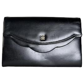 Clutch Vintage Givenchy in pelle nera con chiusura a pressione dorata