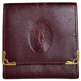 Cartera de cuero vintage Cartier burdeos con broche dorado Francia