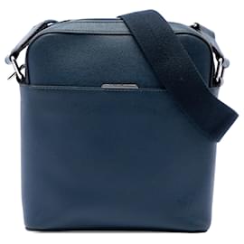 Pochette Anton in pelle Taiga blu Louis Vuitton