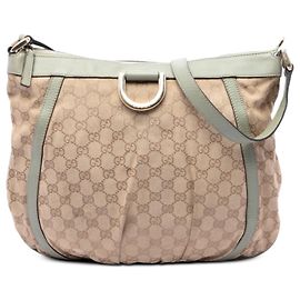 Borsa a tracolla Gucci Abbey in tela GG beige con anello a D