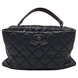 Borsa a tracolla Chanel Portobello in tweed e pelle trapuntata