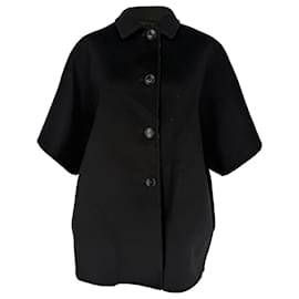 Abrigo reversible Gucci GG en lana negra