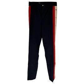 Pantalones de chándal Gucci con rayas en las costuras laterales y botones a presión en lana azul marino