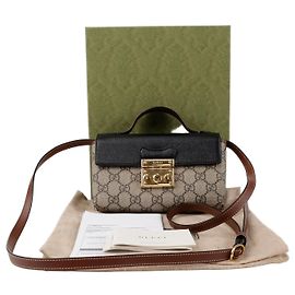 Gucci Mini bolso de mano con asa superior y bandolera en lona GG Supreme con cierre Paddle Lock Negro
