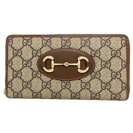 Portafoglio lungo in PVC marrone Gucci