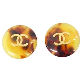 Pendientes de clip Chanel marrón y dorado