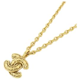 Collana Chanel dorata con pendente