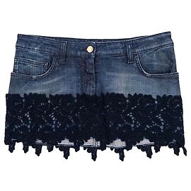 Minifalda vaquera con ribete de encaje floral Dolce & Gabbana de los años 2000