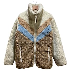 Chaqueta de shearling con firma Coach