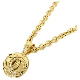 Collana Chanel dorata con pendente