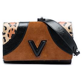 Portafoglio con catena Louis Vuitton Marrone Monogram Wild at Heart Twist