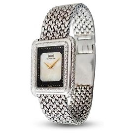 Piaget Protocole 74101 – Ouro branco 18k – Mostrador de madrepérola – Pulseira de elos texturizada – Anos 1980