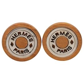 Boucles d'oreilles clips Sellier en bois marron et palladium Hermès