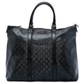 Weekender Gucci nero con stampa GG