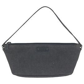 Pochette accessorio in denim e pelle Gucci