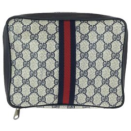Pochette in tela GG Supreme e pelle Gucci