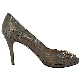 Décolleté con punta aperta Gucci Holographic Crackle New Hollywood Horsebit in pelle oro
