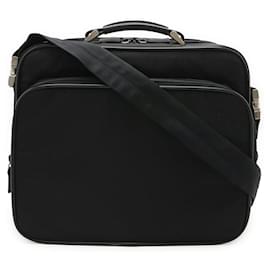 Valigetta Prada in nylon e pelle con logo triangolo