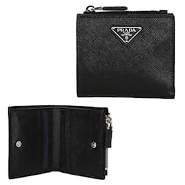 Prada Portacarte con zip in Saffiano con logo Triangle