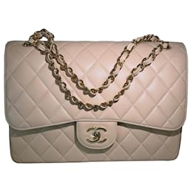 Chanel Classic Flap Media Pelle Caviar Beige