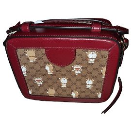 Borsa a tracolla Gucci x Doraemon in pelle rossa e tela GG Supreme