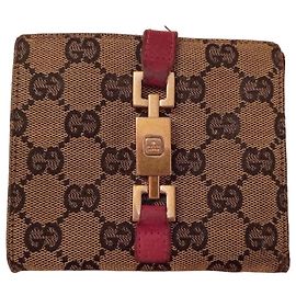Gucci GG Monogramm Canvas Portemonnaie mit bordeauxrotem Leder