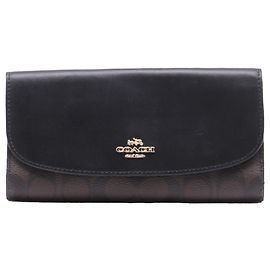 Portafoglio Continental Coach Signature in tela rivestita marrone e pelle
