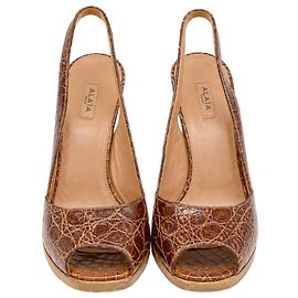 Scarpe con tacco a punta aperta Alaïa in pelle con stampa animalier