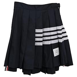 Minifalda plisada Thom Browne de 4 rayas en poliamida negra