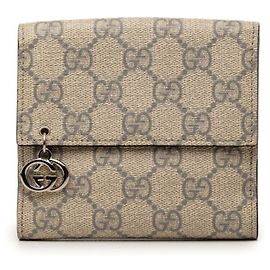 Portafoglio bi-fold Gucci GG Supreme in beige