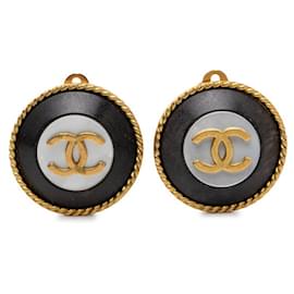 Orecchini tondi vintage Chanel Coco Mark