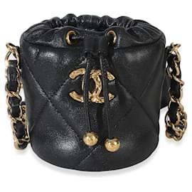 Micro borsa bucket Chanel in agnello trapuntato nero