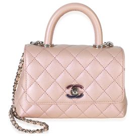 Borsa Chanel Mini Coco Top Handle Flap in Caviar Trapuntato Iridescente Rosa Chiaro