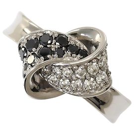 Autre Marque Bague anneau en or blanc 18K avec diamant noir