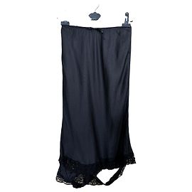 Autre Marque Rave Review Falda midi de raya diplomática negra y encaje