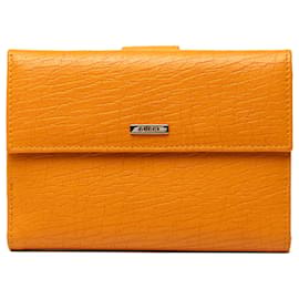 Cartera bifold de piel de becerro texturizada naranja Gucci