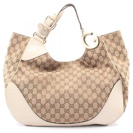 Bolsa de Ombro Gucci GG Canvas