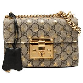 Borsa a tracolla con catena e lucchetto Gucci GG Supreme