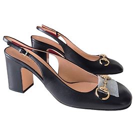 Gucci Sandali Slingback in pelle nera con morsetto