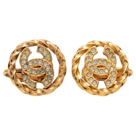 Orecchini clip Chanel Gold CC placcati oro e strass tondo corda