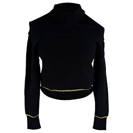 Suéter de punto Alexander McQueen con hombros descubiertos en lana negra